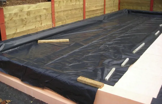DPM or radon barrier installed over ISOQUICK insulated raft